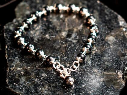 karingali sliver cap bracelet